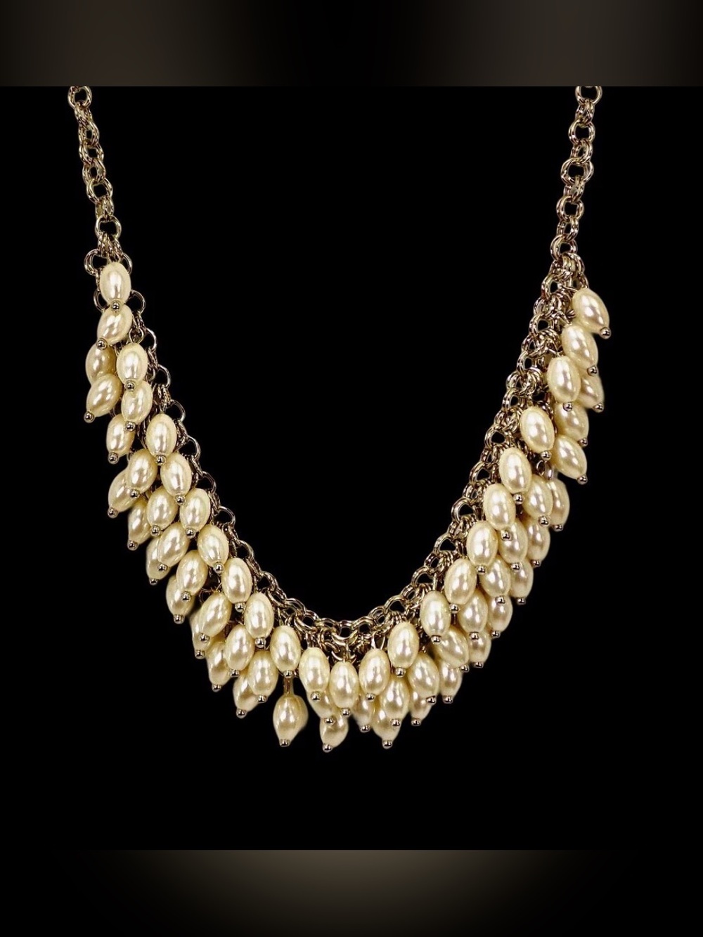 White bead necklace in a cluster beaded fringe design attached to link chain New